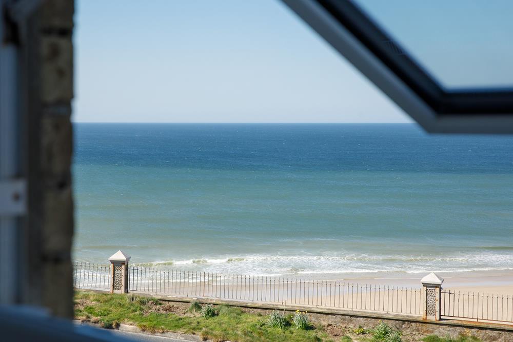 Gaze out to sea as the tide ebbs and flows.