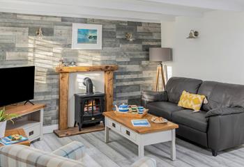 Spend a cosy evening in the sitting room after a day on Perranporth beach.