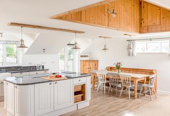 The large kitchen and dining area have plenty of room for all 8 guests to dine together.