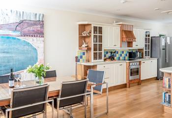 Traditional meets modern in the open plan kitchen and dining space.