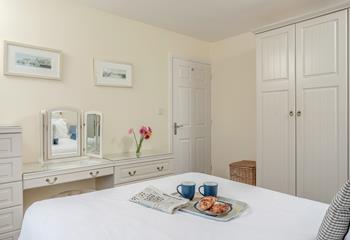 The cosy double bedroom is a peaceful haven.