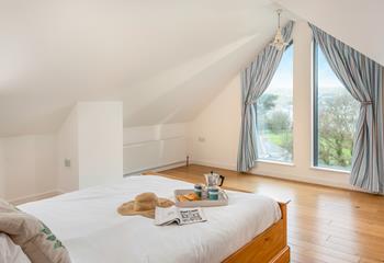 Wake up to floor to ceiling views of Perranporth and across the sand dunes.