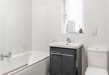 The master bathroom is on the ground floor, easily accessible from the bedrooms.