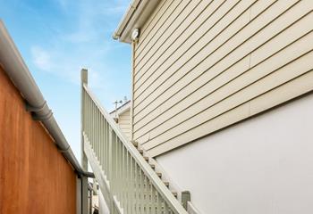 From the lane, steps take you up to a beachside retreat.