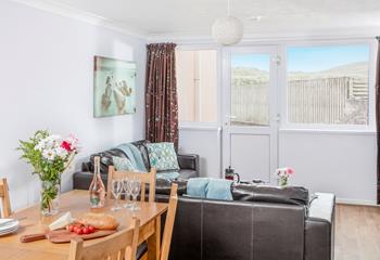 Relax and dine together in the open plan living area.