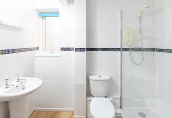 Step from the sand and into the spacious walk-in shower.