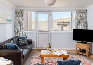 Put your feet up and unwind by the sea.
