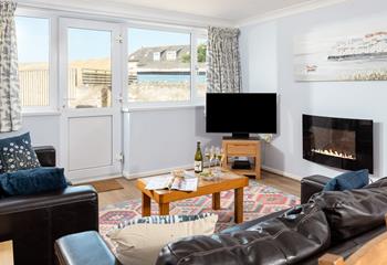 Find the beach on your doorstep and views of the sand dunes at 16 Sand Bay.