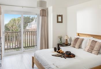 The double bedroom is a tranquil space where you'll comfortably drift off after a day on the beach.