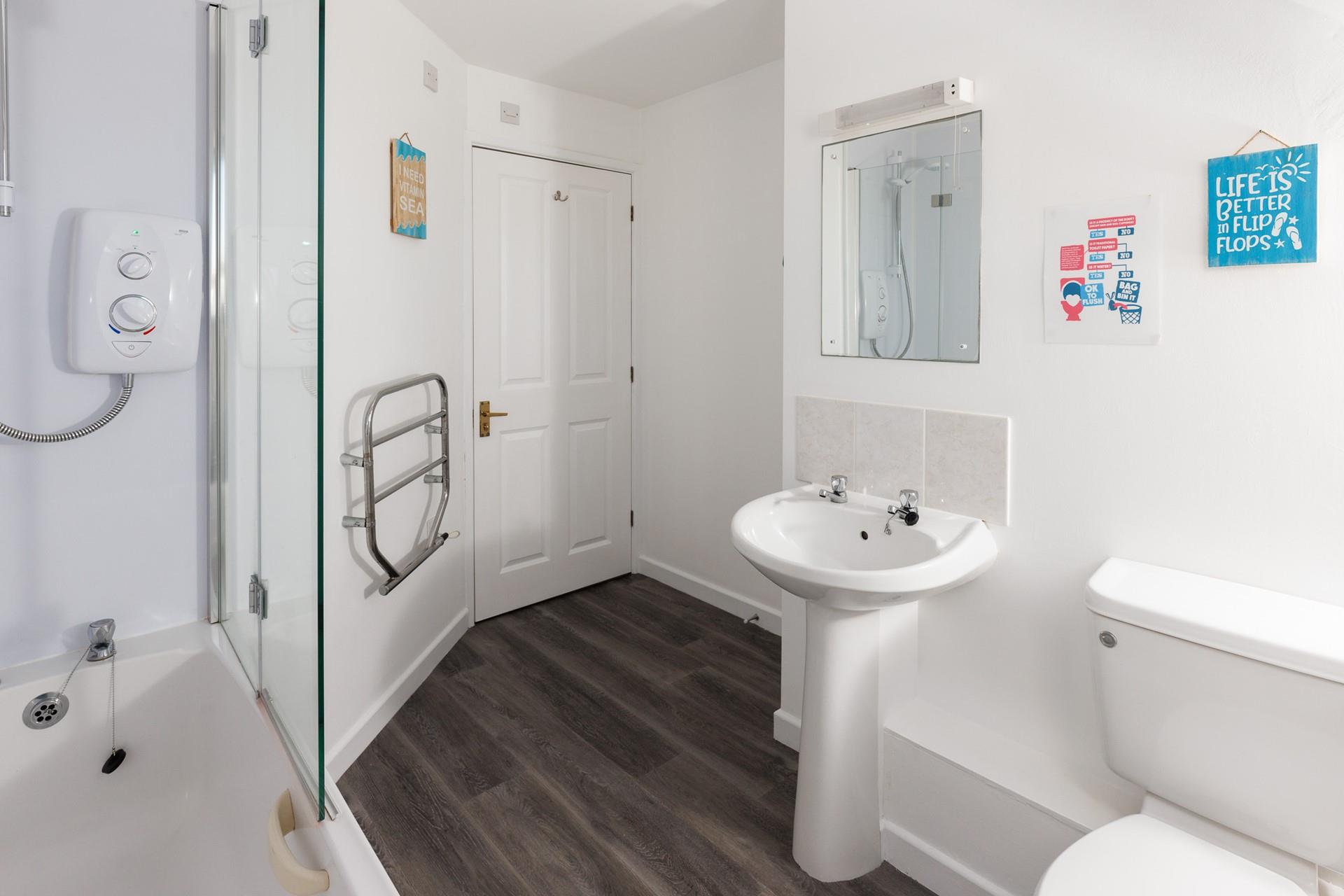 After a blissful day on the beach, soak or shower the sand away.