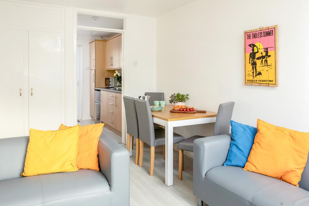 A light and bright beachside apartment, with the beach just a stone's throw away!