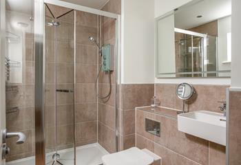 The en suite bathroom is great for spot of post-beach pampering. 