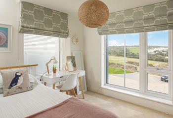 The single bedroom enjoys both country and coastal views!