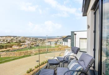 Put your feet up and gaze across out to sea from the living room balcony.