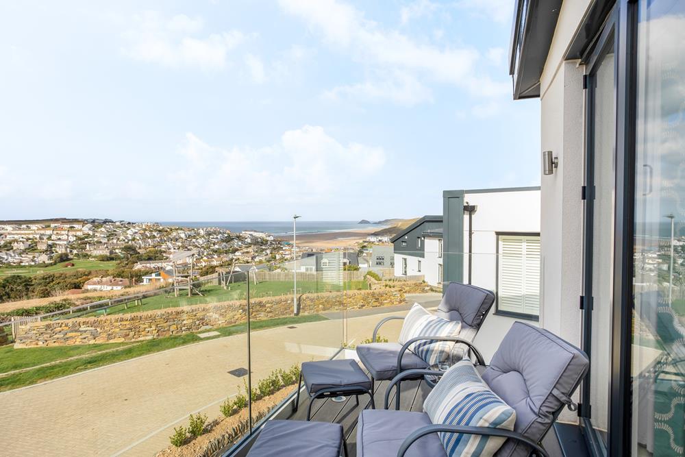 Put your feet up and gaze across out to sea from the living room balcony.