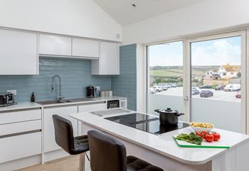 Simple and sleek, the kitchen will delight the foodies in the family.