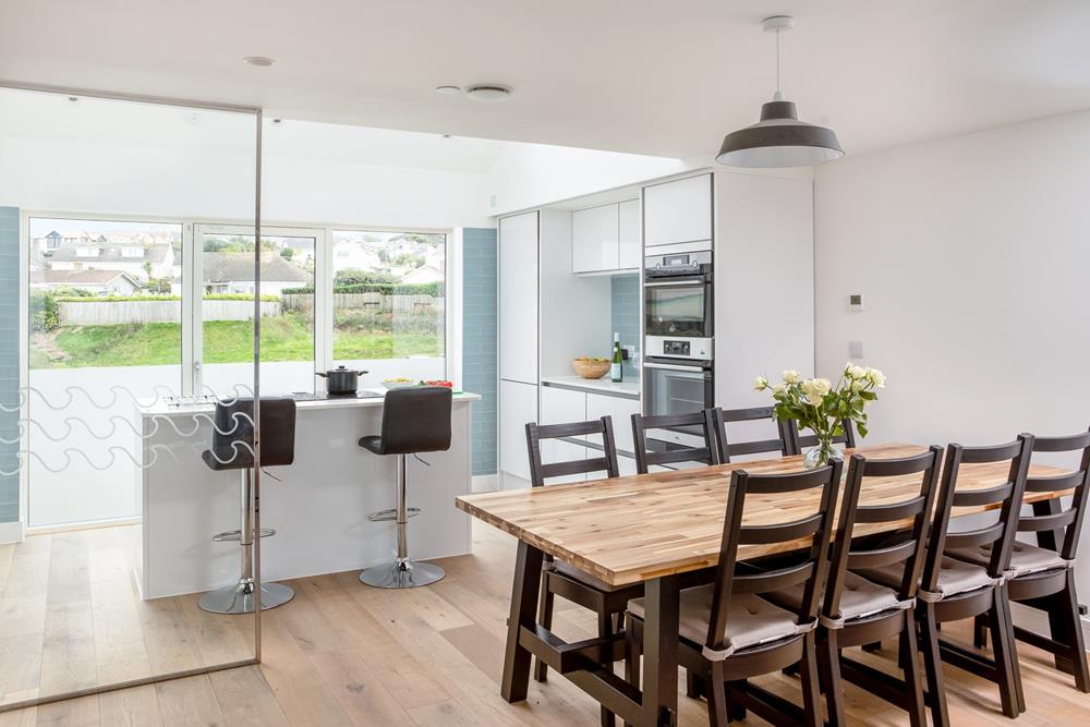 Cook and eat together in the welcoming dining space and kitchen.