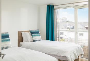 Light and airy, the first floor bedroom is a peaceful sanctuary.