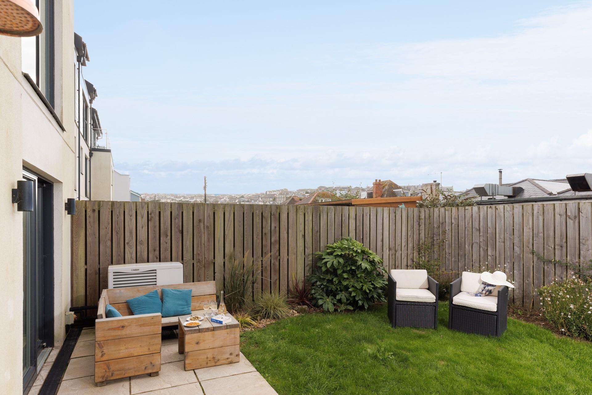 Relax and unwind in the sun trap garden!