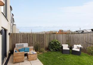 Relax and unwind in the sun trap garden!