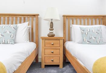 Adults and children will love the stylish twin bedroom.