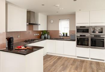 Sleek and stylish, with an integrated coffee machine, the kitchen will be a home from home for the foodie in the family.