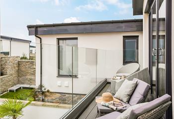 Sit back, relax and take in the summer sunrises from the rear balcony, overlooking the garden.