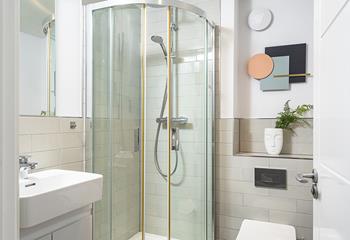 A second en suite, means no rush for the bathroom in the mornings and choose from a power or rainfall shower to start your day.