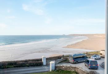 Uninterrupted views look across the horizon to Holywell Bay.