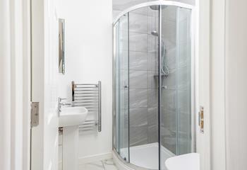 A modern bathroom with a rainfall shower, for an invigorating start to the day!