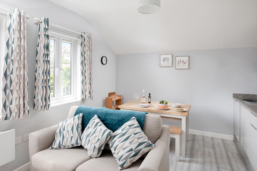 Harlyn is a modern retreat with an open plan living, dining and kitchen area.