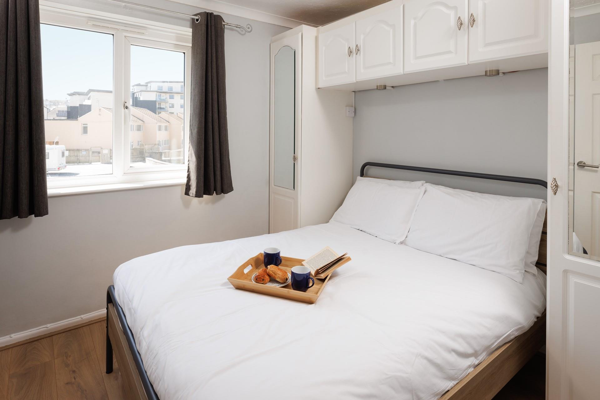 Open the master bedroom window and let the sea air in!