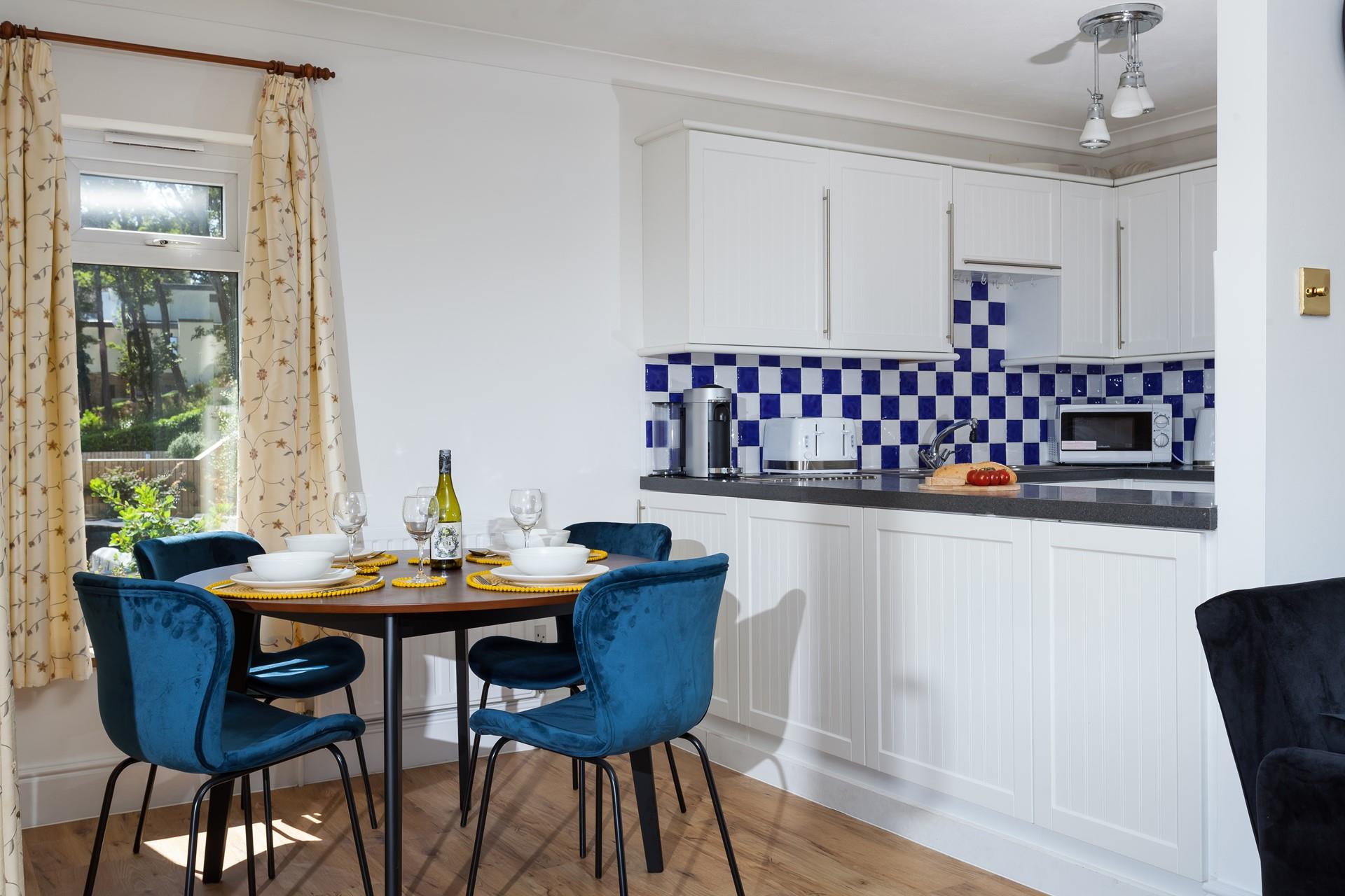 The stylish dining table is the perfect space to enjoy time together over delicious meals.