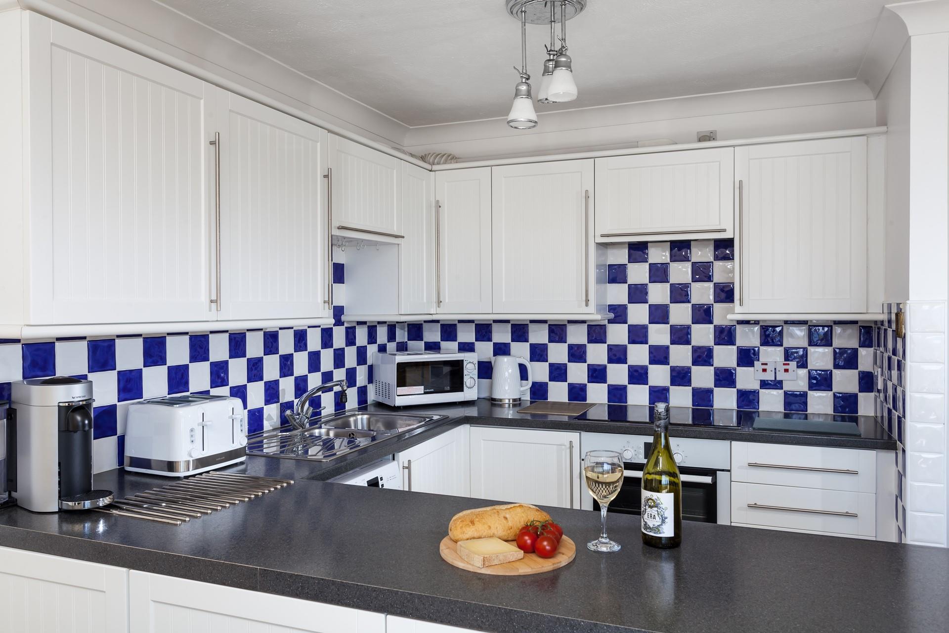 The kitchen is well-equipped for the chef of the family to rustle up culinary delights.