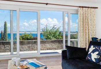 Open the patio doors and let in the fresh breeze while you enjoy the view of St Ives Bay.