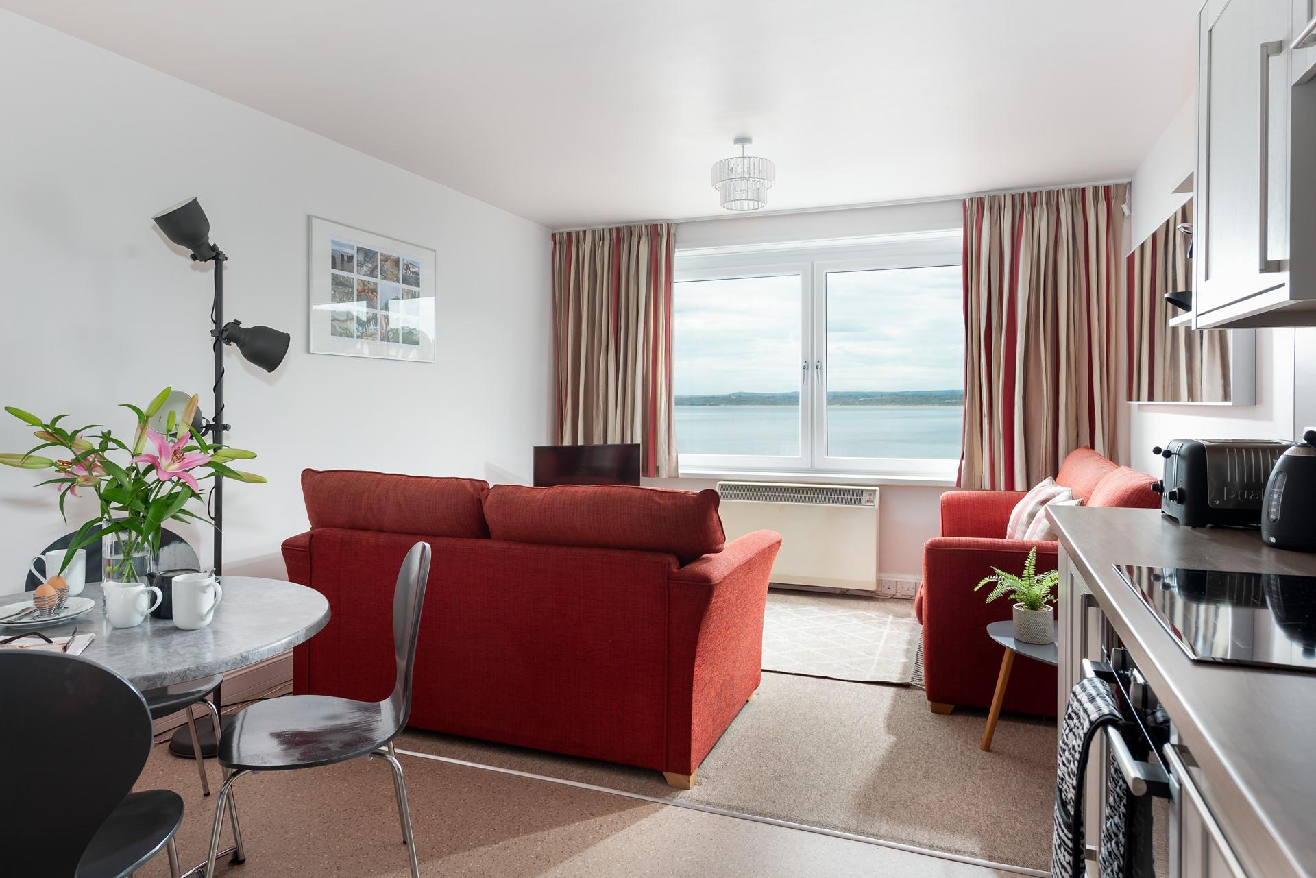 This apartment is perfect for a romantic retreat by the coast.