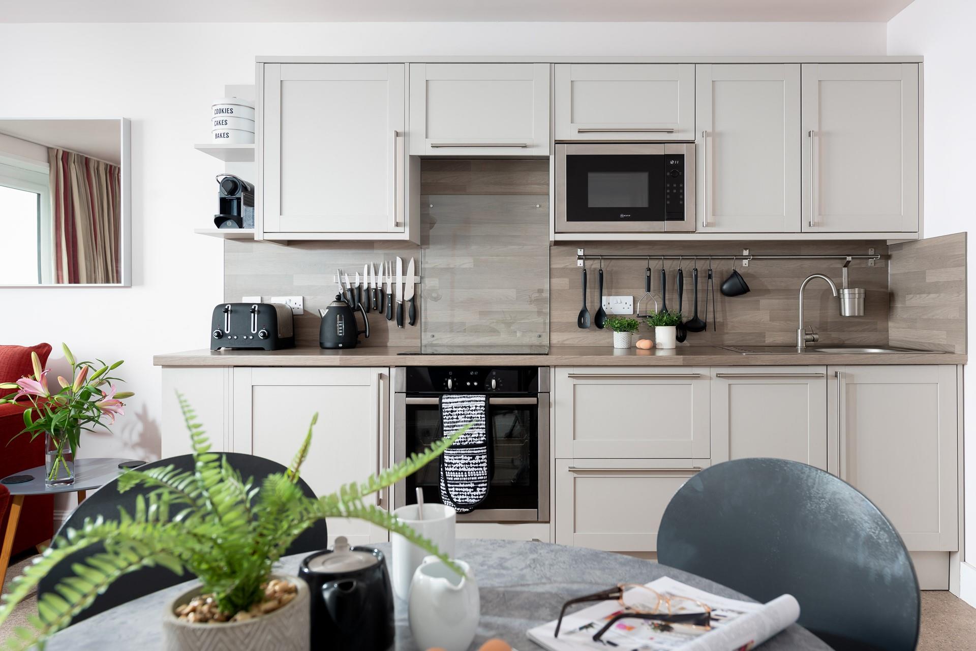 The kitchen is modern and well-equipped for cooking up a storm.