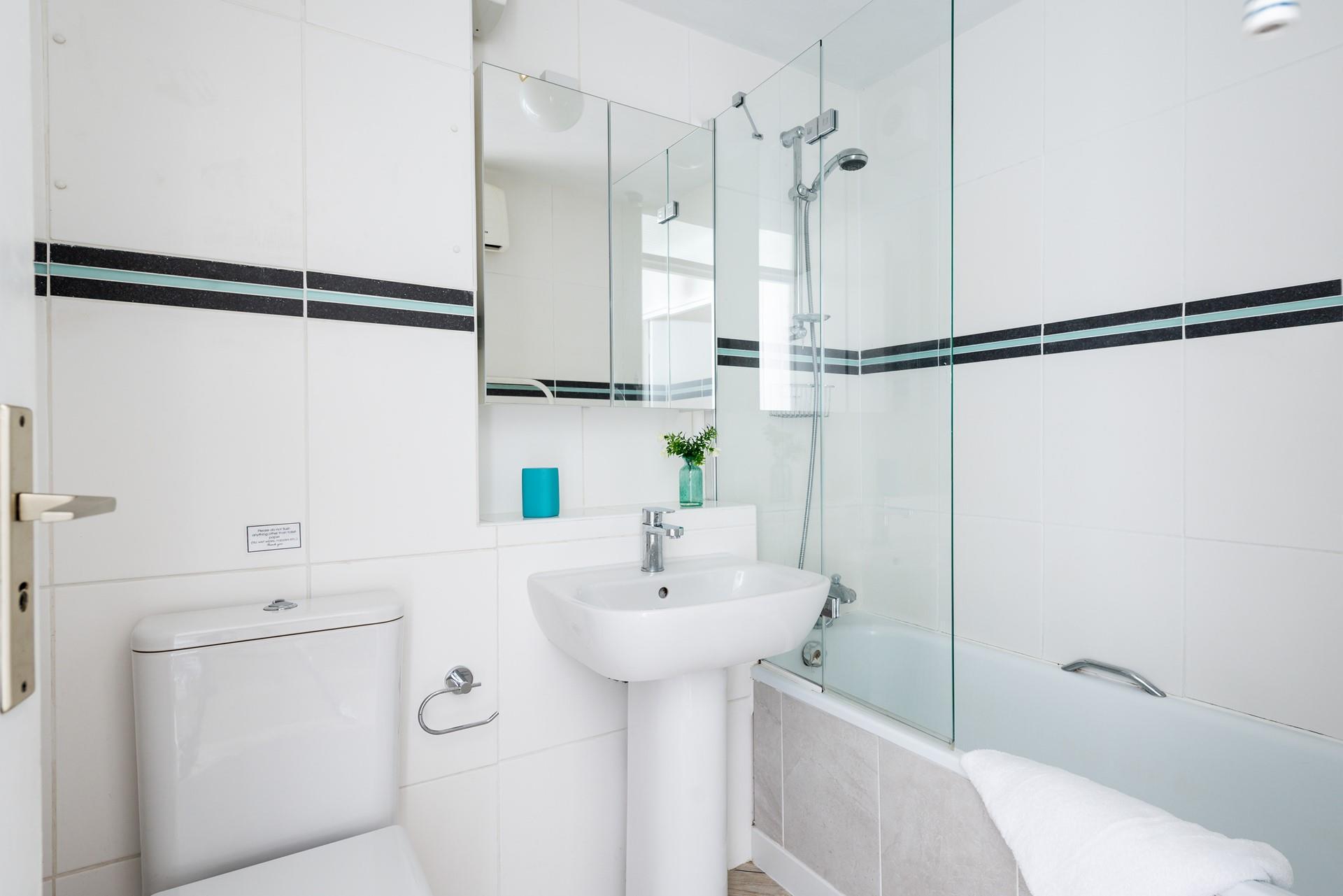 Choose from a bath or a shower in the spacious bathroom.