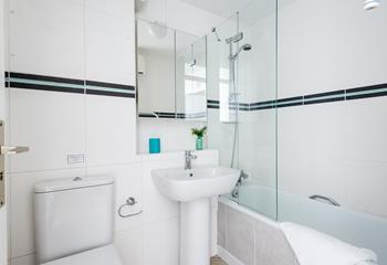 Choose from a bath or a shower in the spacious bathroom.