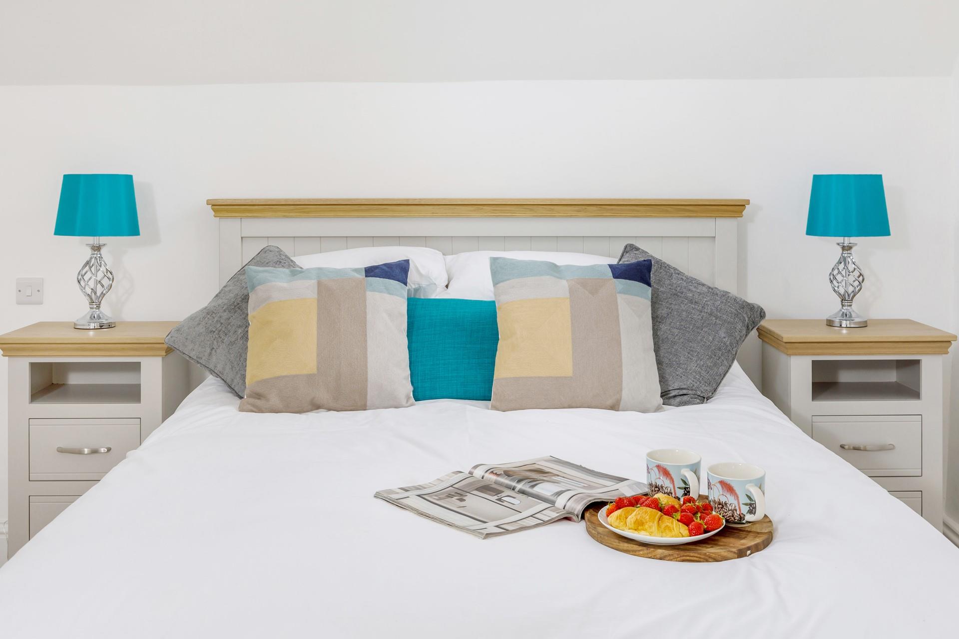 Bedroom 1 has a sumptuous king size bed for a restful night's sleep.