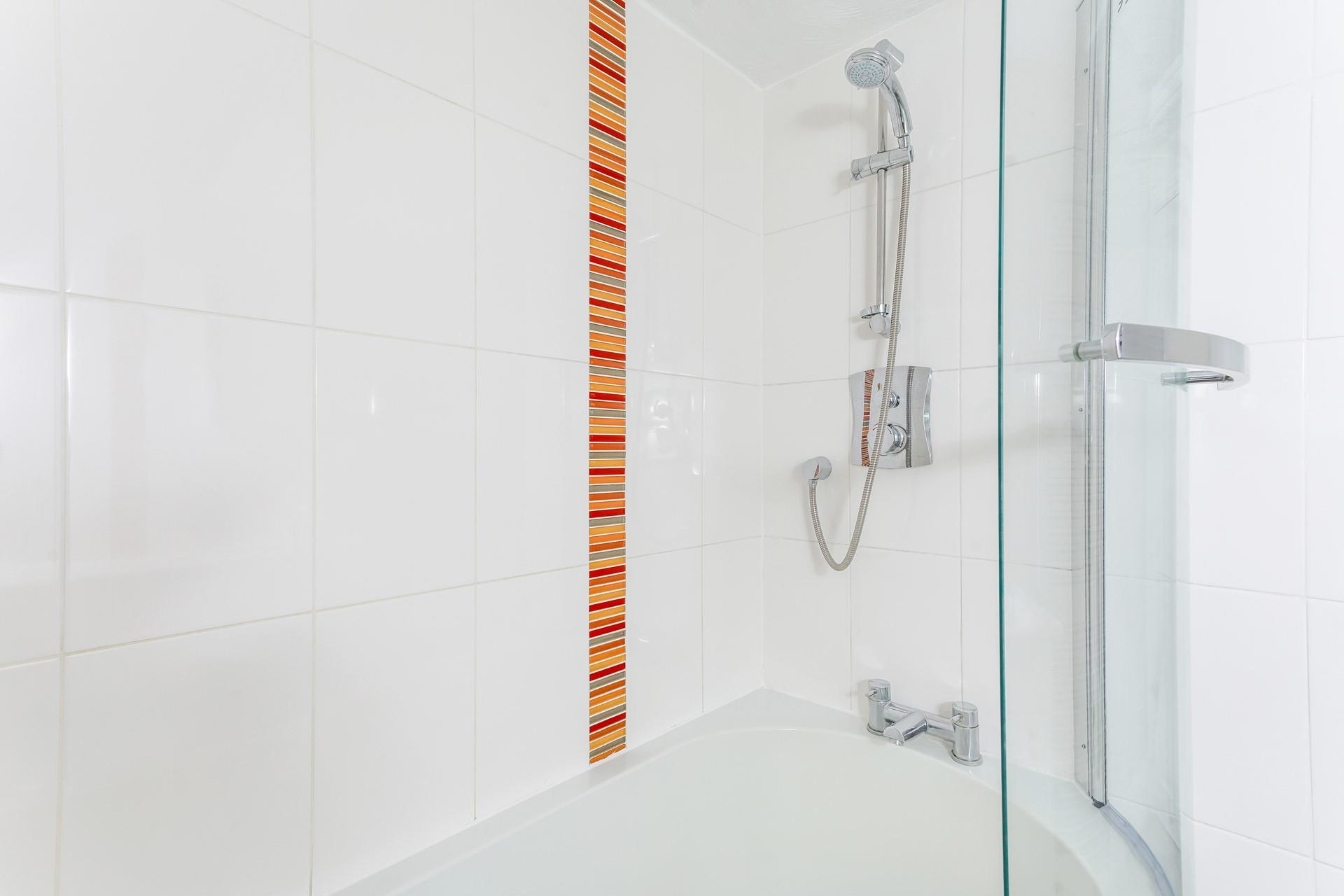 Wash off your sandy toes in the shower after a day on Hayle beach.