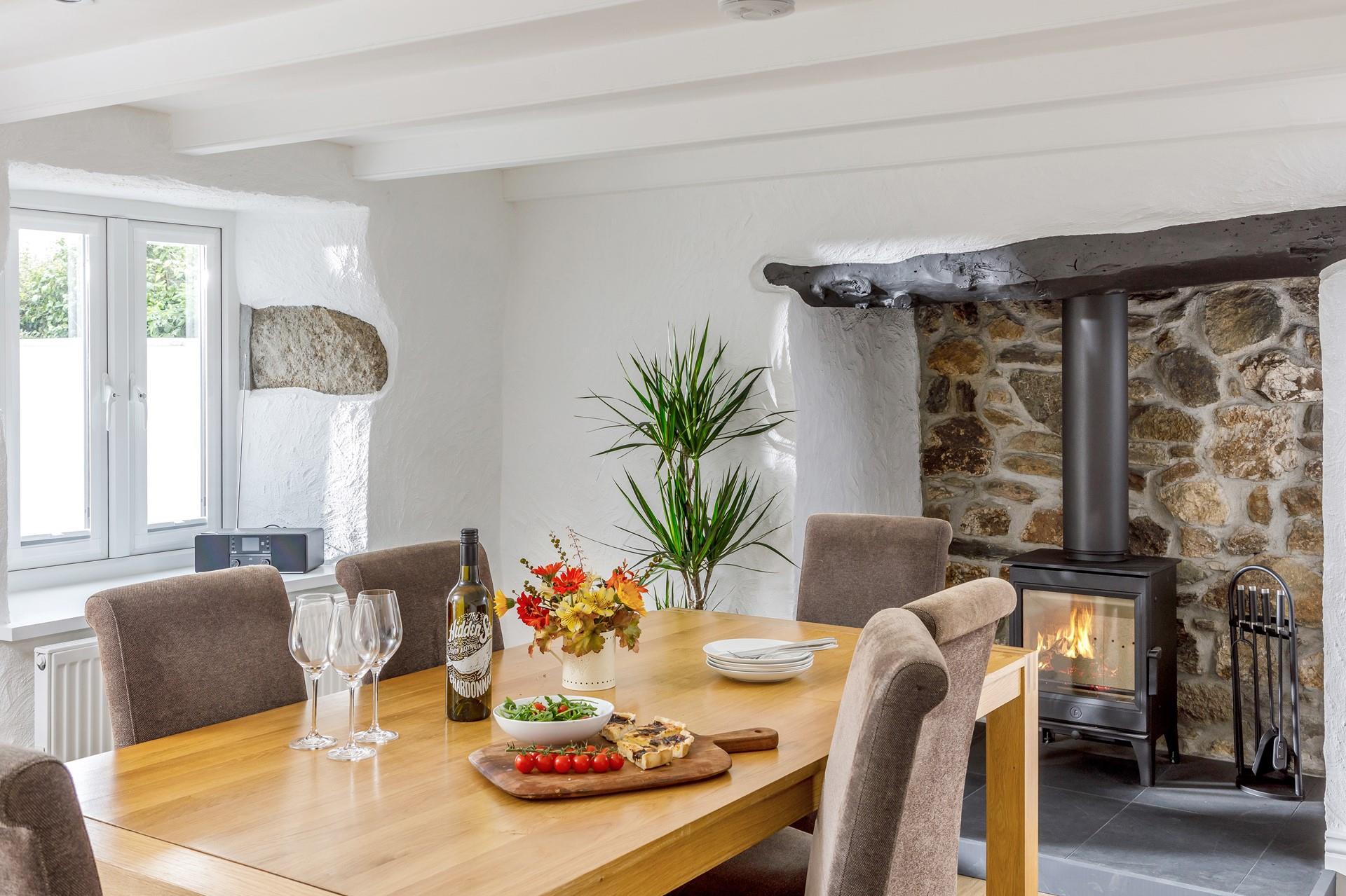 The dining room also has a woodburner so you can enjoy a hearty meal in cold months with the woodburner glowing.