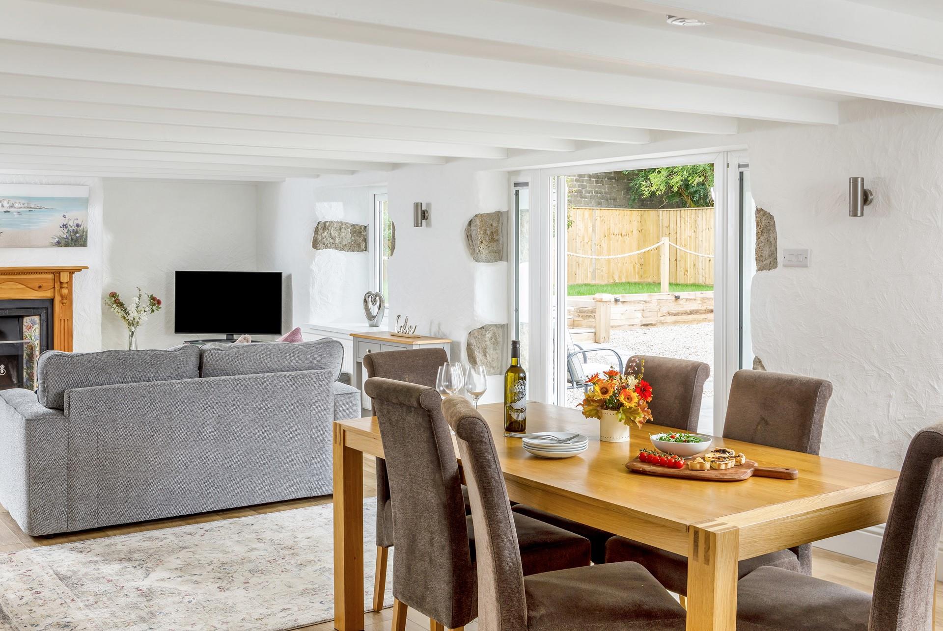 Open the patio doors to let the summer breeze run through the cottage.