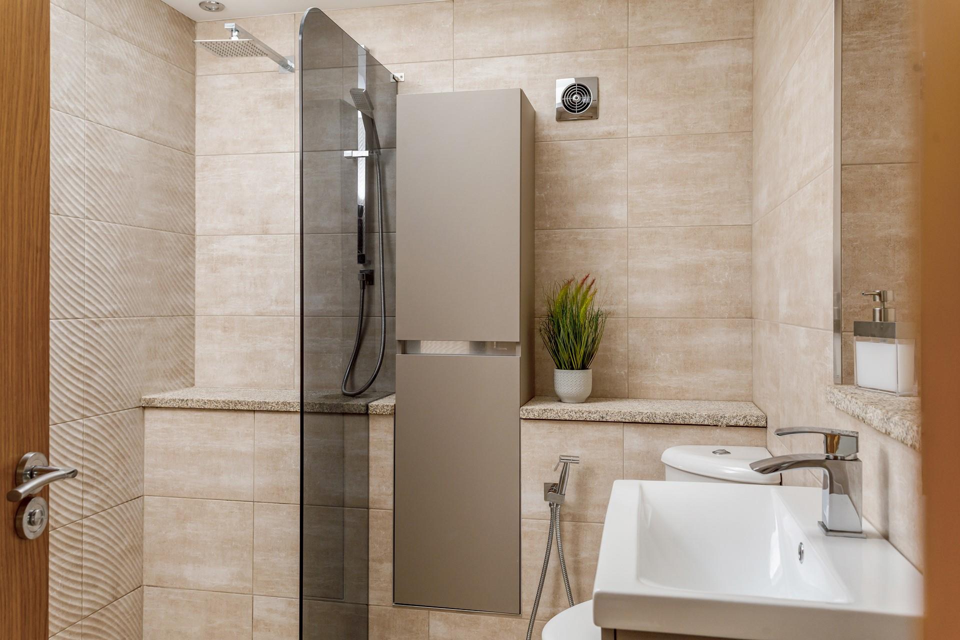 The wet room has a large walk-in shower for getting ready in the mornings.