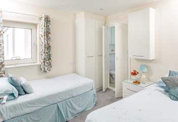 Twin beds in bedroom 2 offer a comfortable night's sleep for children or adults.