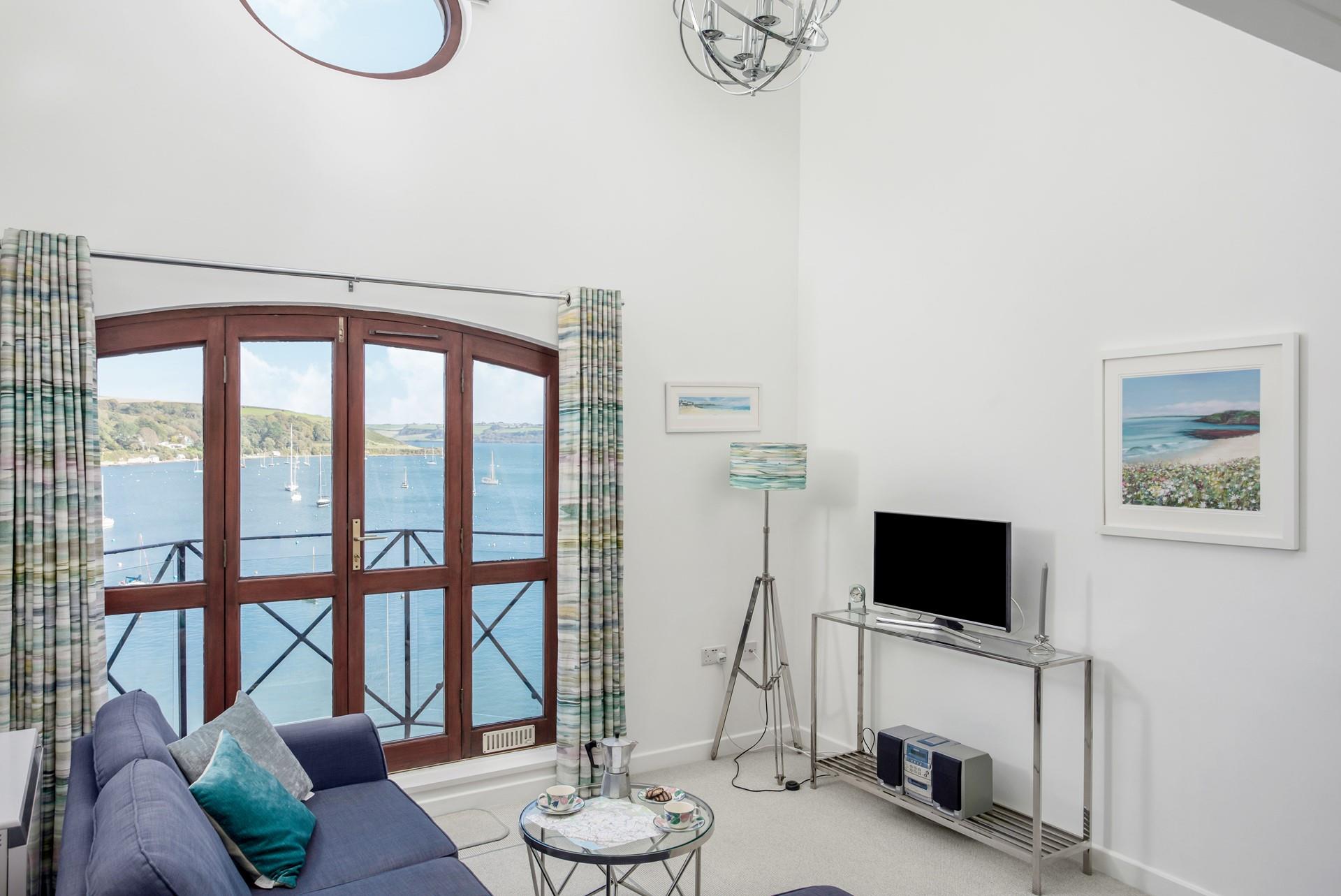 Relax with the boats bobbing in the harbour.