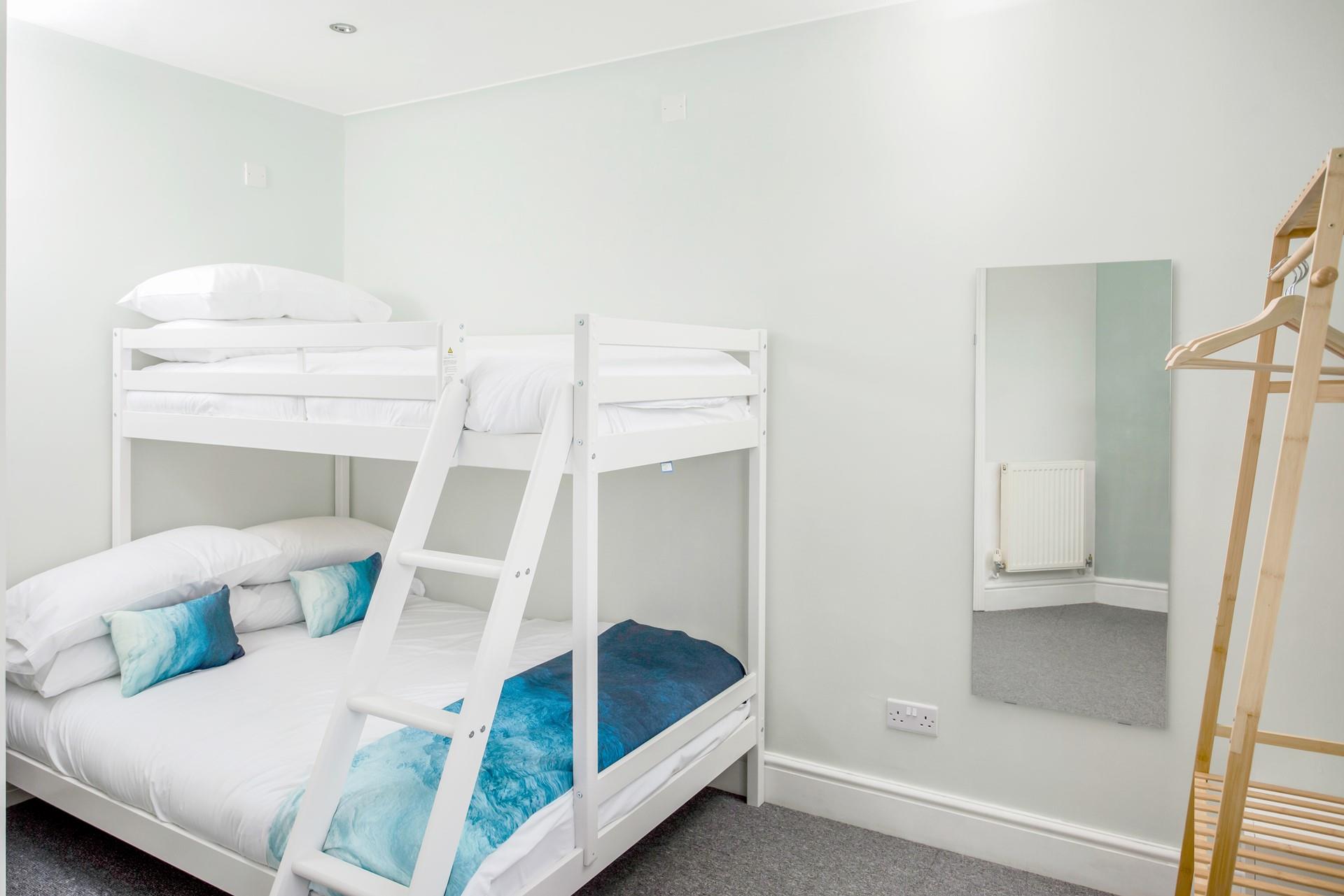 The kids will love the triple sleeper bunk beds for memorable sleepovers each night!