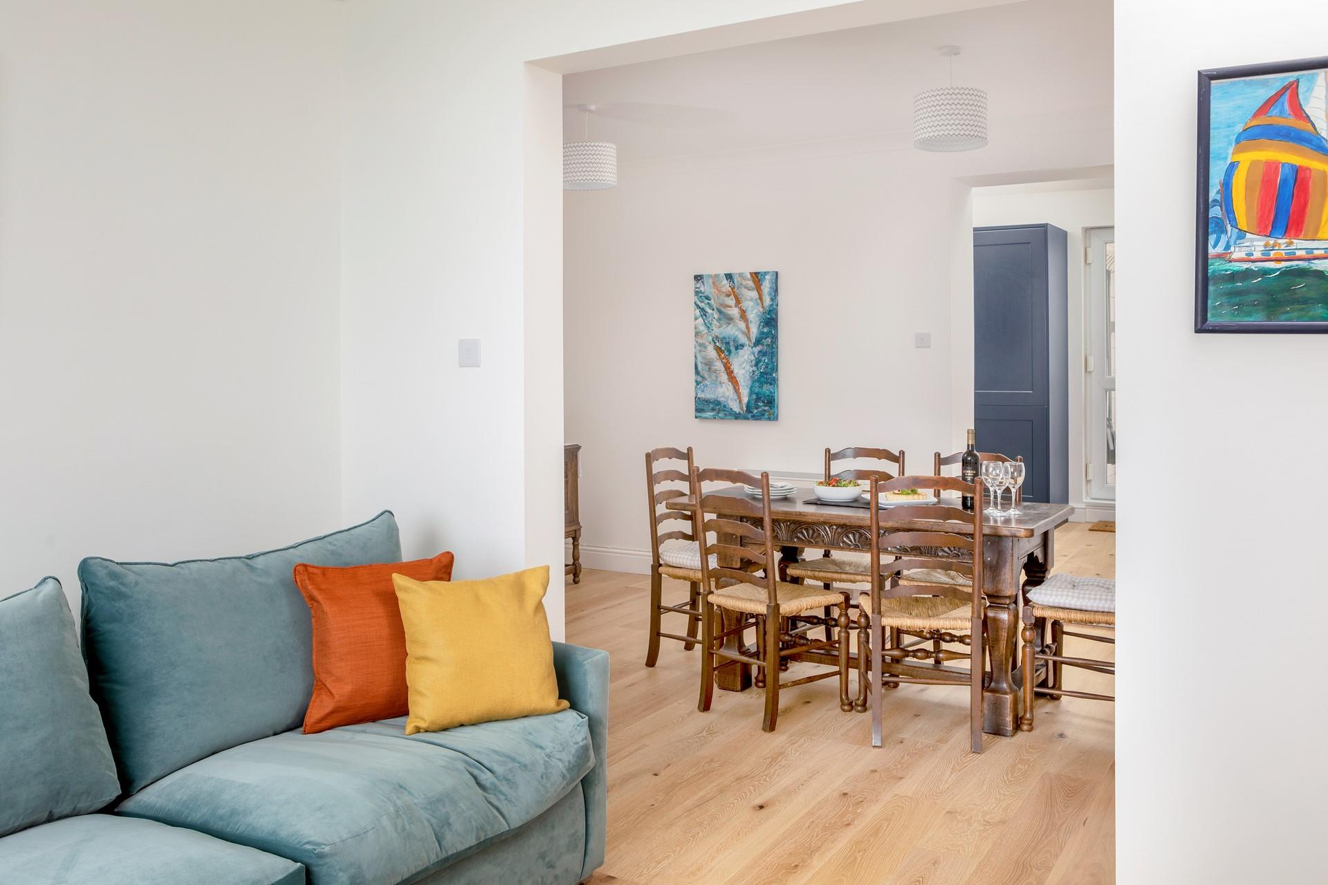 Retire to the sitting room after tucking into a tasty feast around the table.