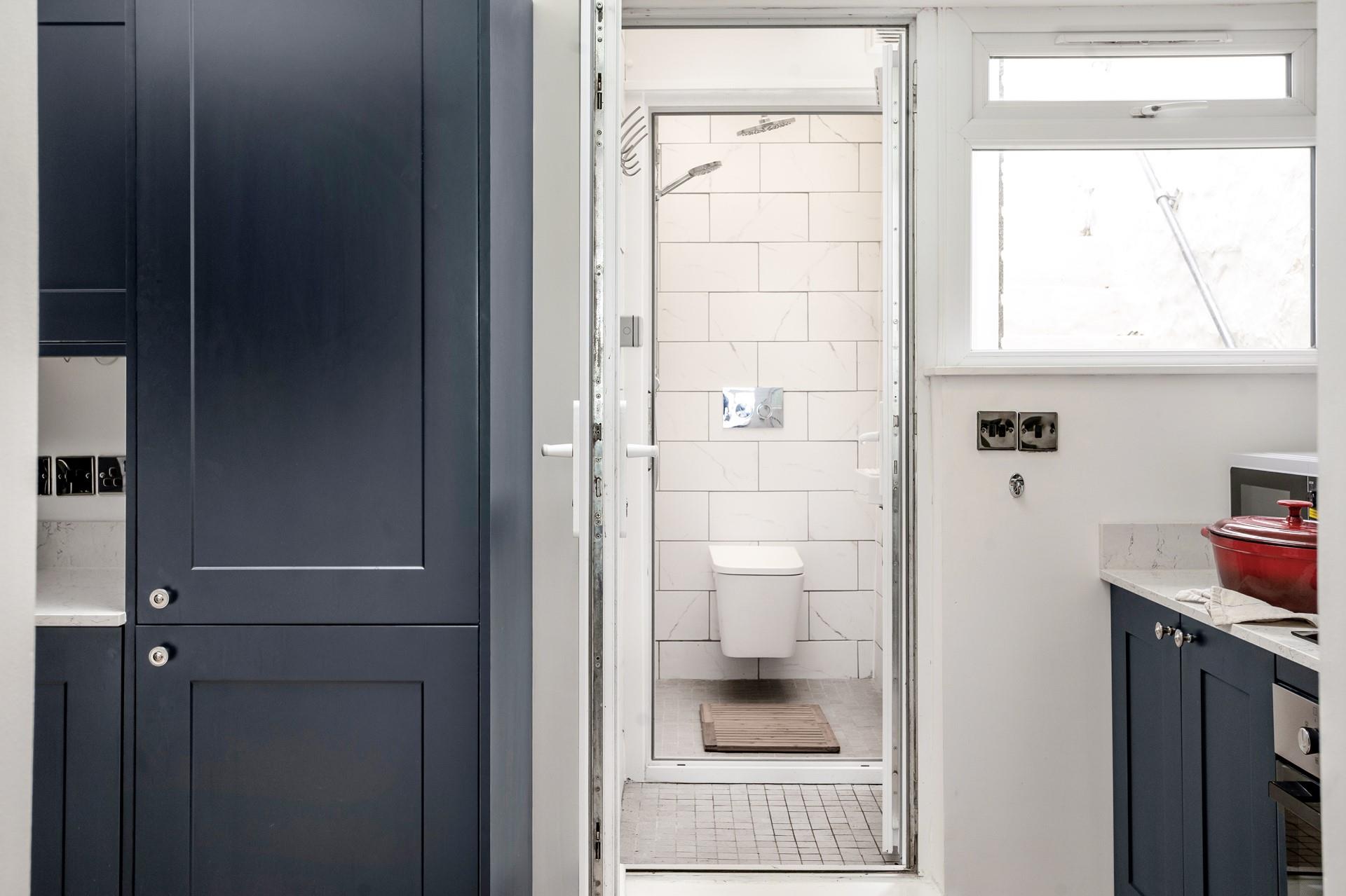 There is a ground floor wet room accessed from the kitchen.