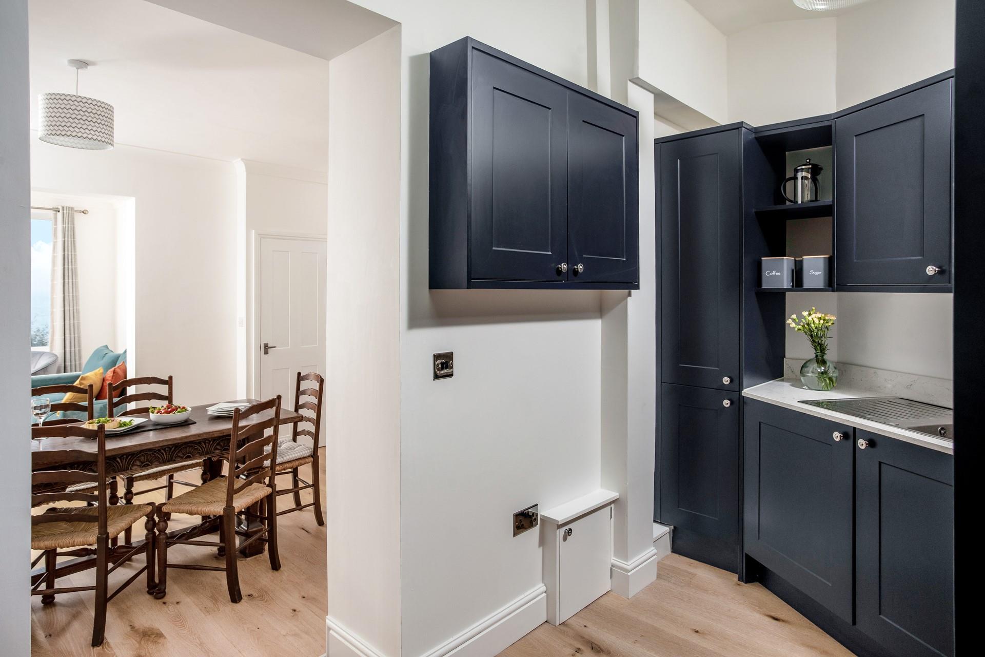 The kitchen is modern and well-equipped for cooking up a storm.